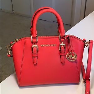 Red Michael Kors handbag
